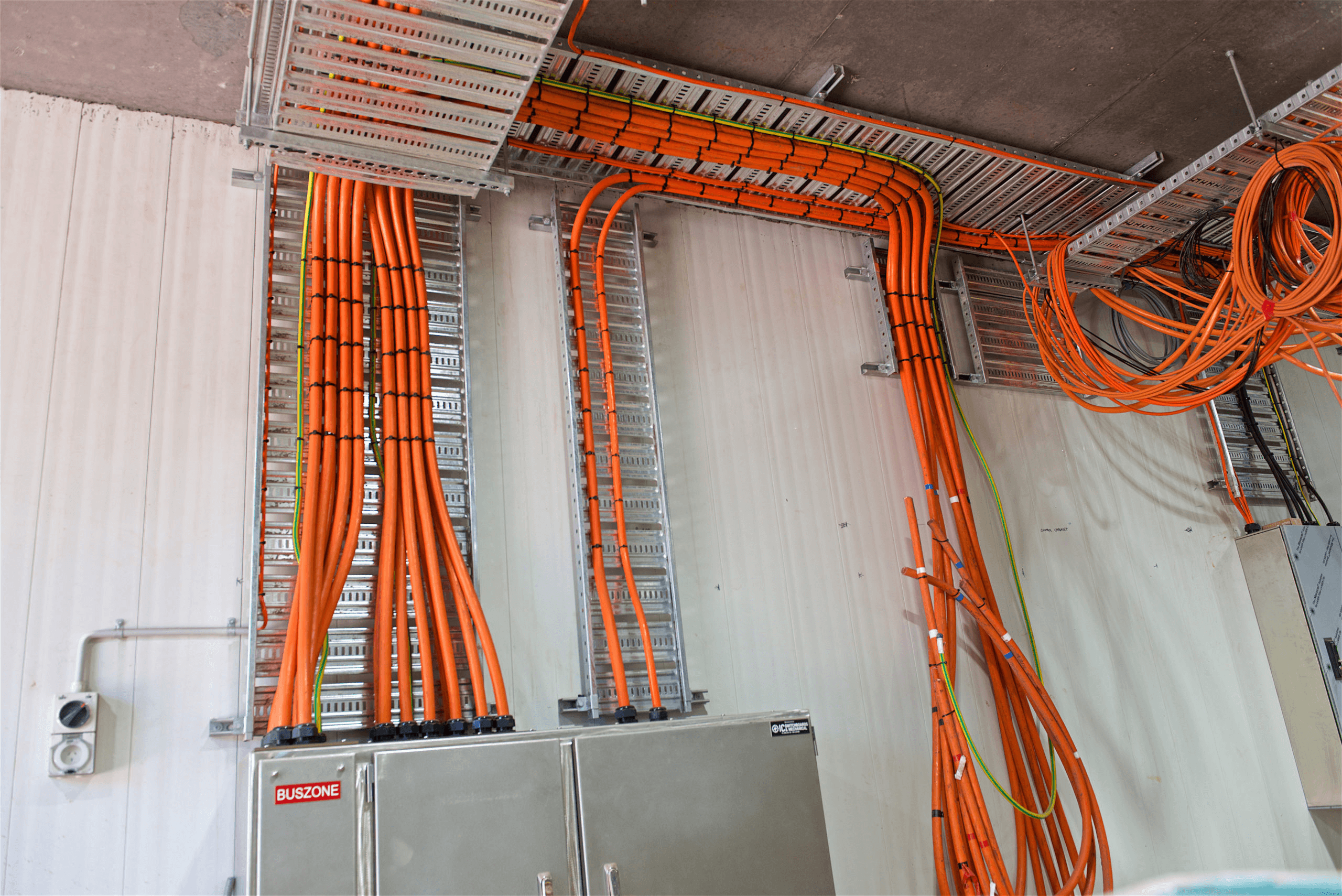 Electrical cables running up the wall inside the pump house at Jamberoo Action Park