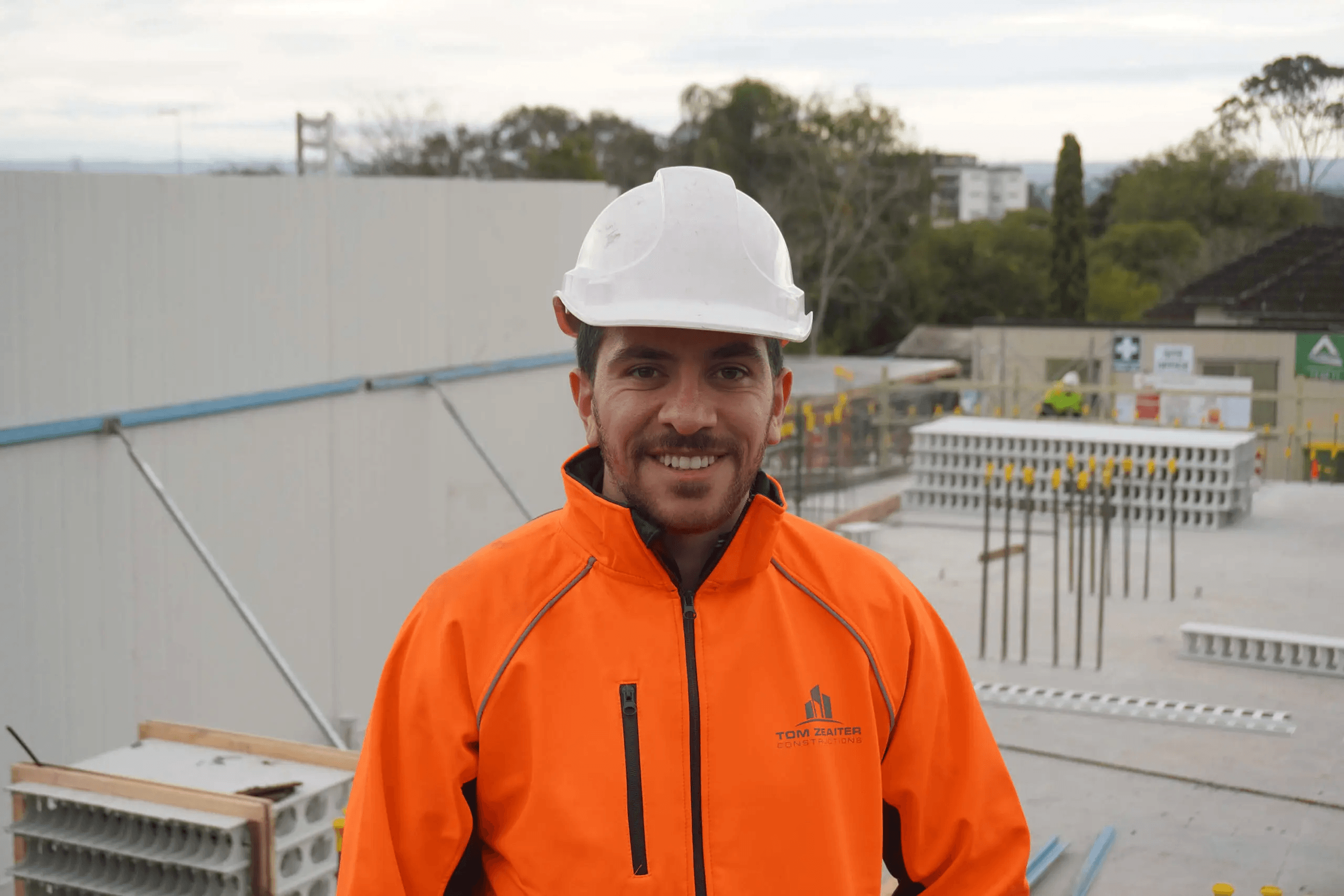 Andrew Zeaiter standing in front of Western Sydney project site