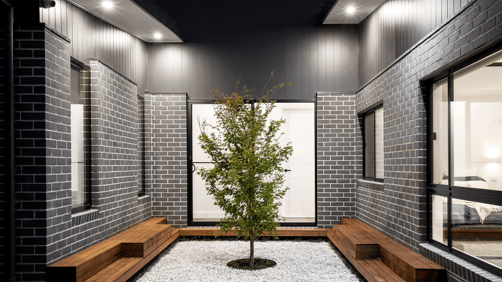 Landscaped courtyard with Cemintel Edge